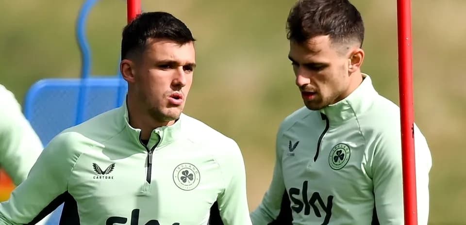 Two players discussing during training session