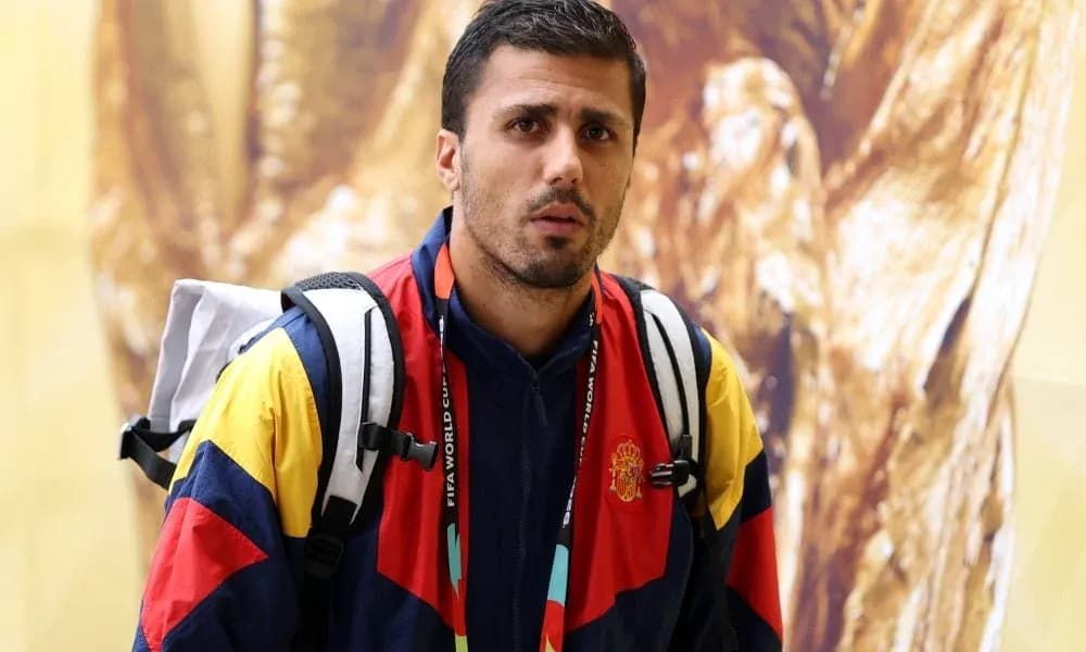 Athlete wearing Spain team jacket with backpack