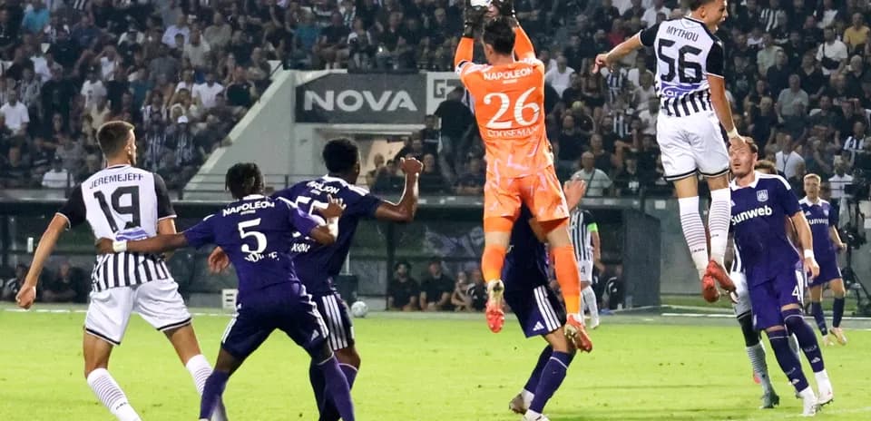 Goalkeeper catching ball during PAOK match