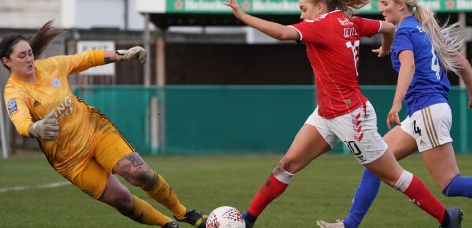 Player attempting to score against Leicester City goalkeeper