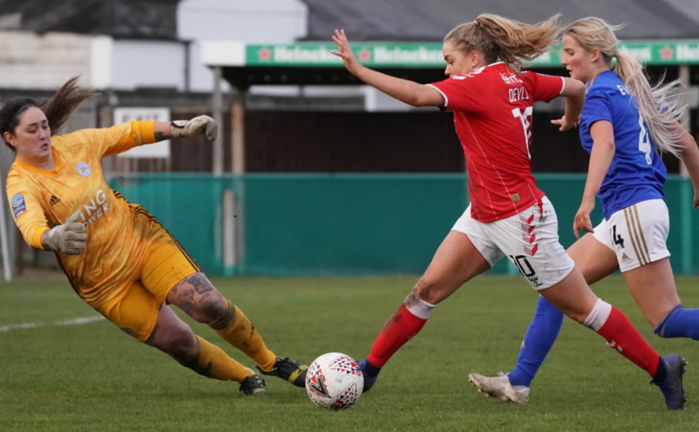 Player attempting to score against Leicester City goalkeeper