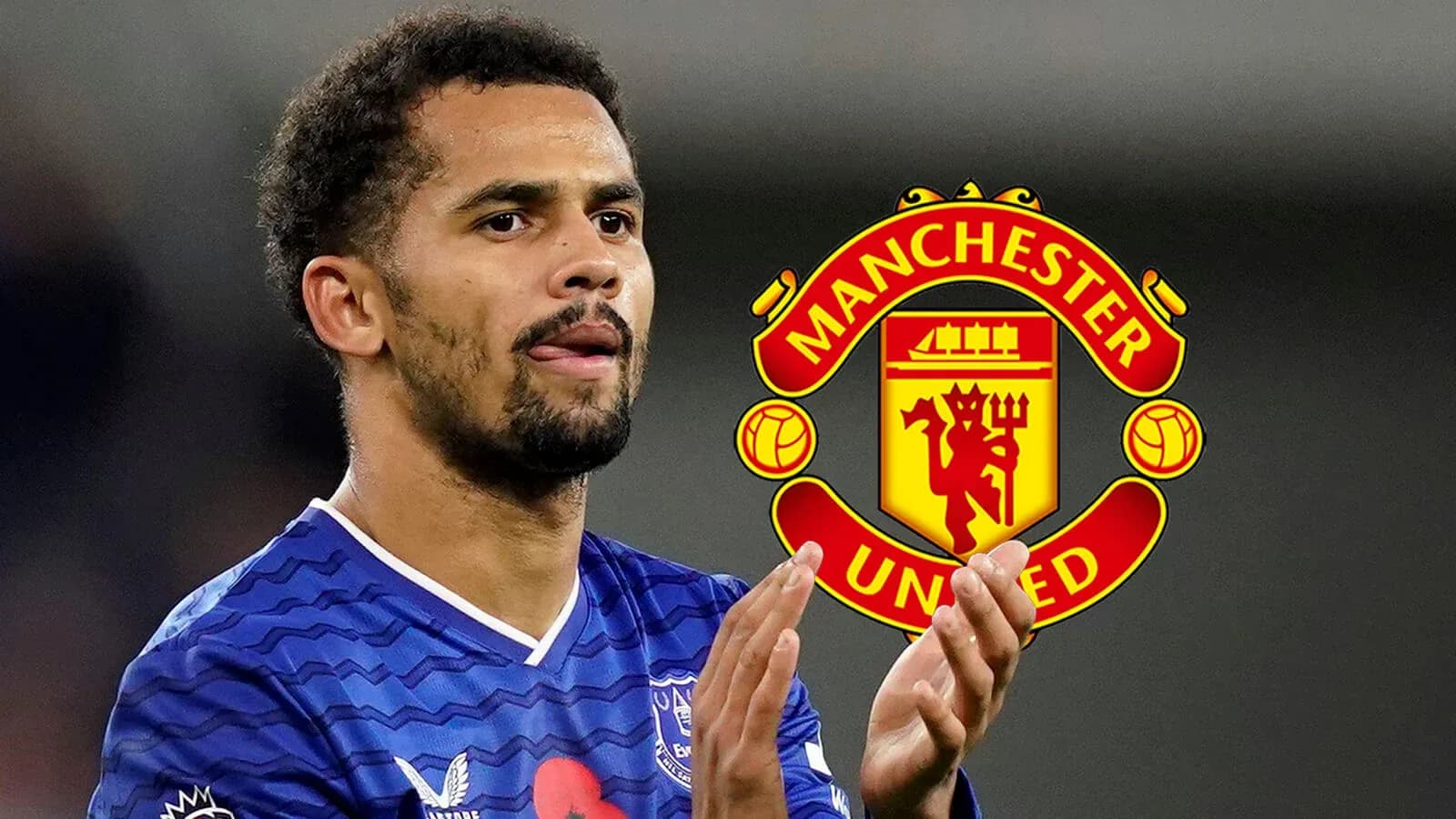 Player applauding with Manchester United logo in background