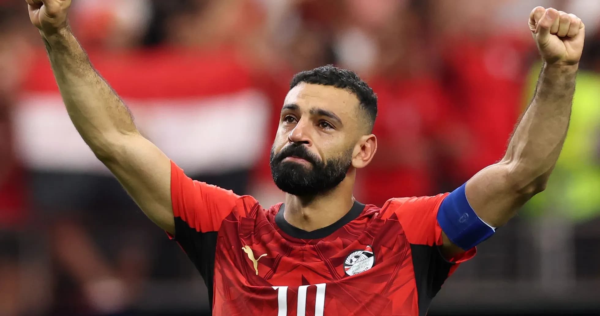 Player celebrating with raised arm during match