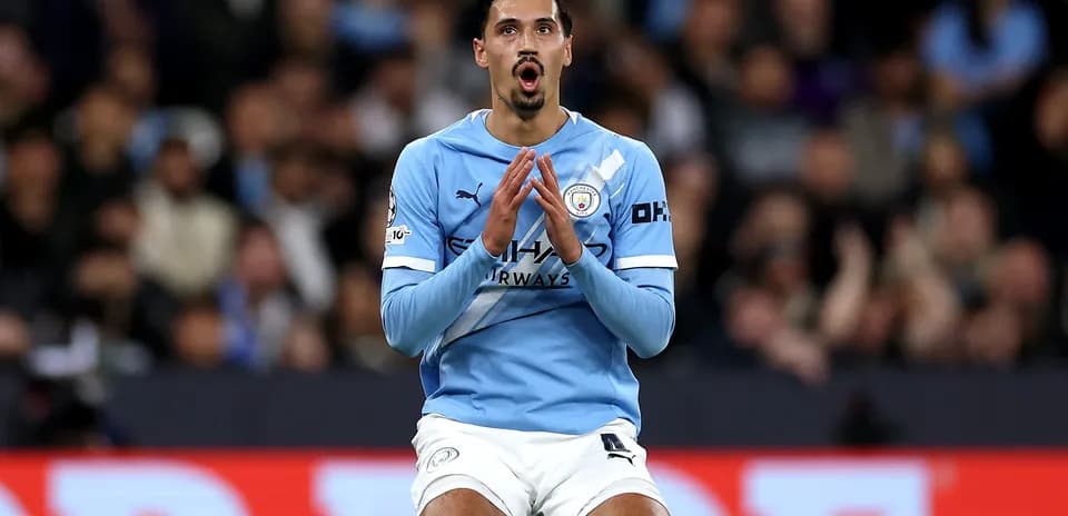Player in blue jersey reacting on the pitch