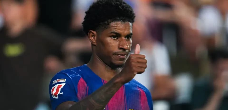 Player giving thumbs up during match celebration