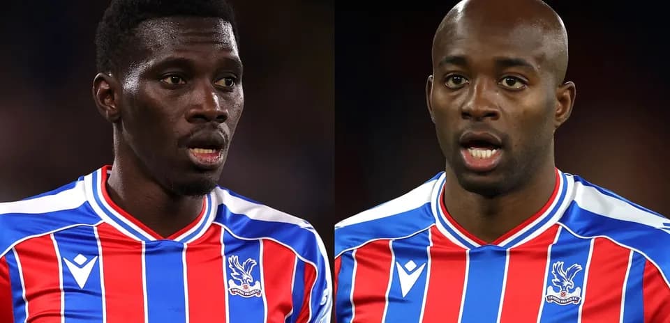 Two Crystal Palace players in team jerseys