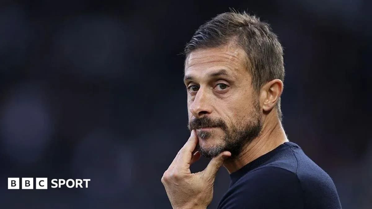 Manager contemplating during match at stadium Manager contemplating during match at stadium
