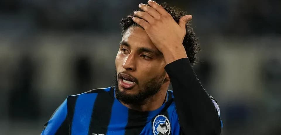 Player with hand on forehead during match