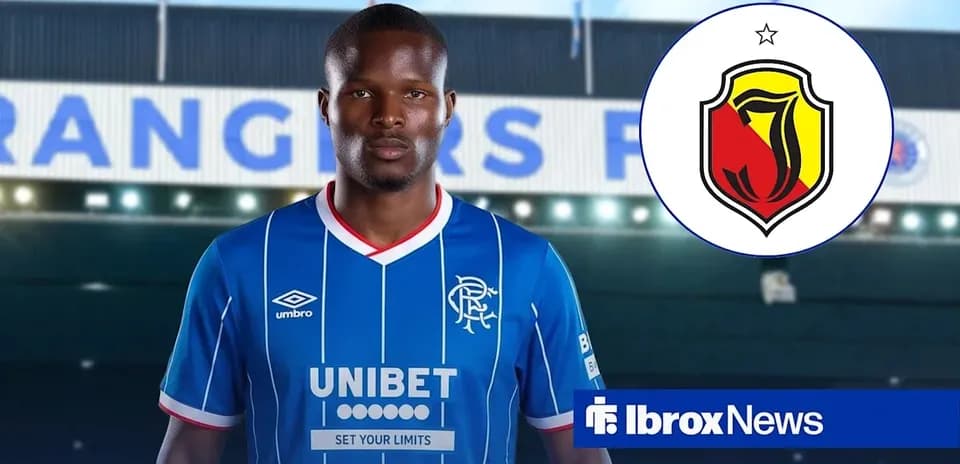Player wearing Rangers FC jersey in front of stadium