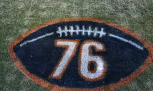 Football field logo with number 76 painted