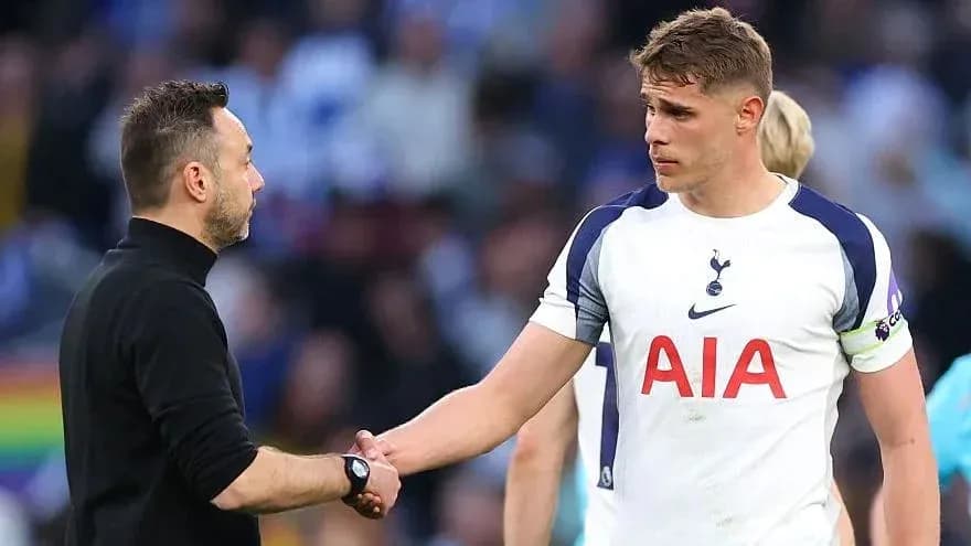 Manager shaking hands with player after match
