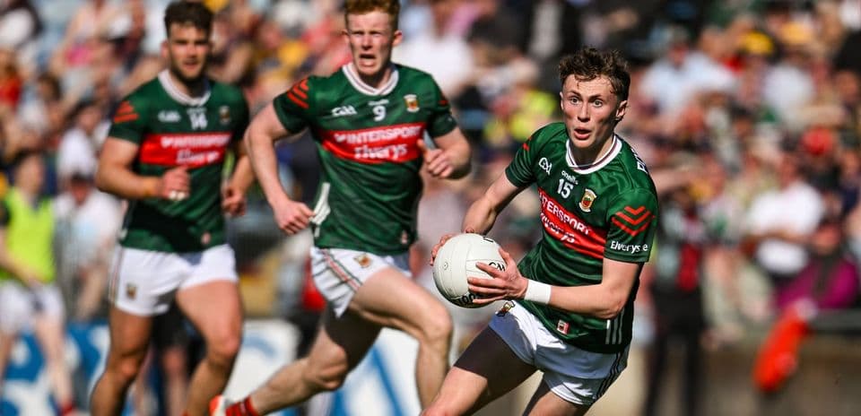 Mayo player running with ball during match