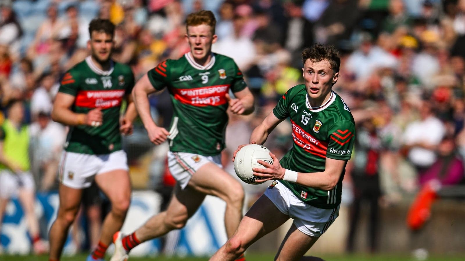 Mayo player running with ball during match