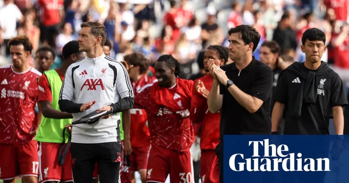 Liverpool players applauding fans after the match