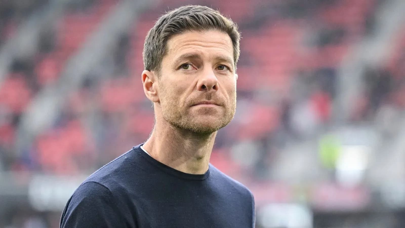 Coach observing the match from the sidelines