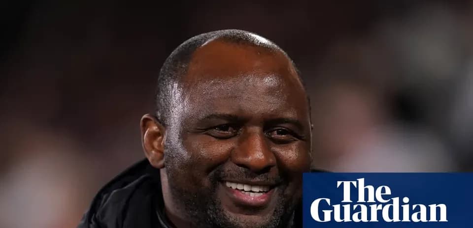 Smiling coach during a match or event