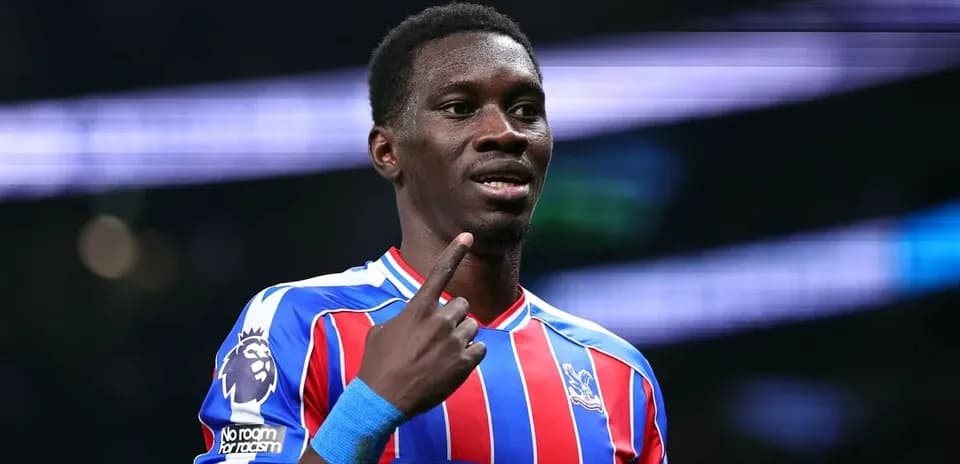 Player celebrating and pointing during a match