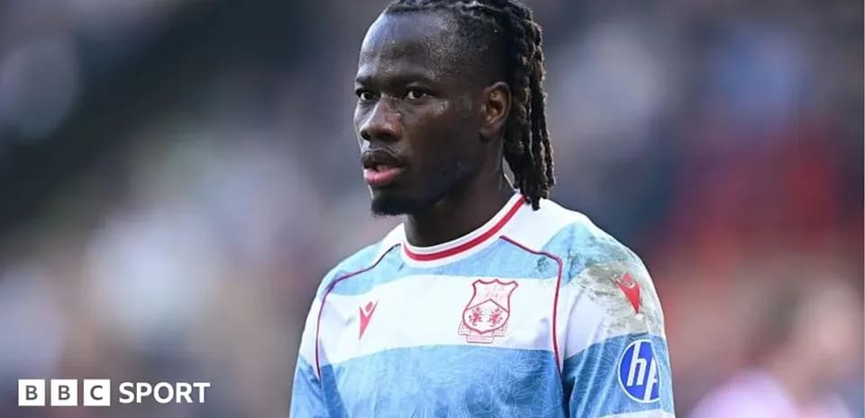 Player in team jersey during match