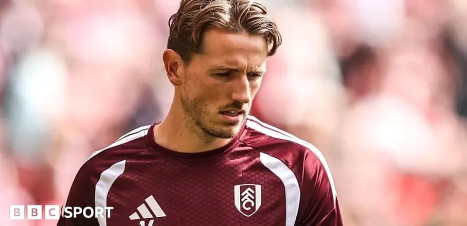 Player wearing Fulham jersey during warm-up session