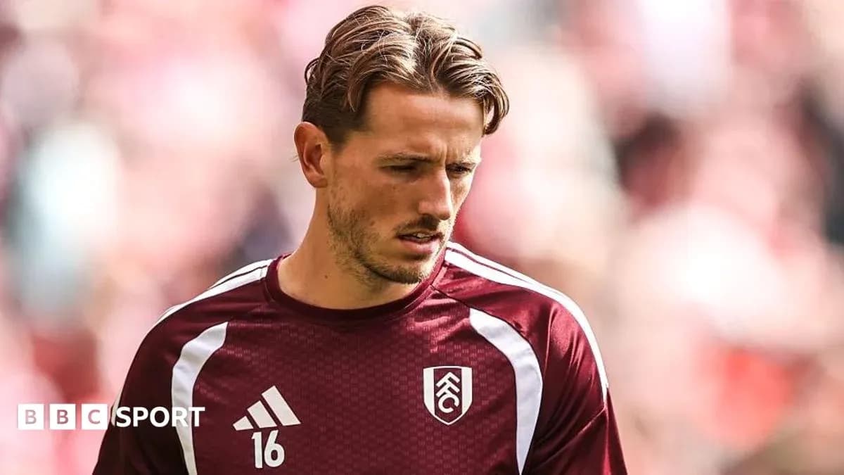 Player wearing Fulham jersey during warm-up session