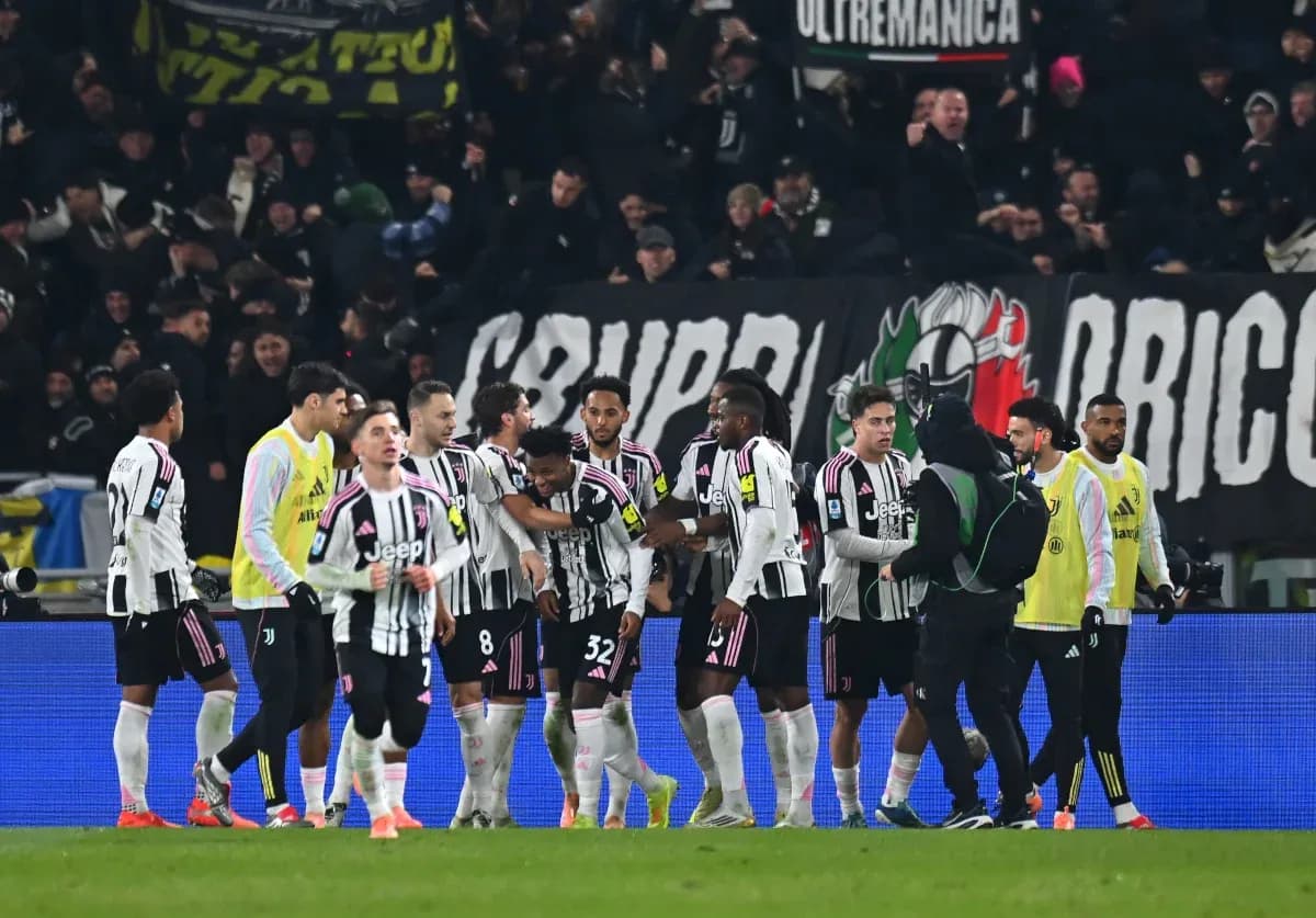 Juventus players celebrating with fans after match