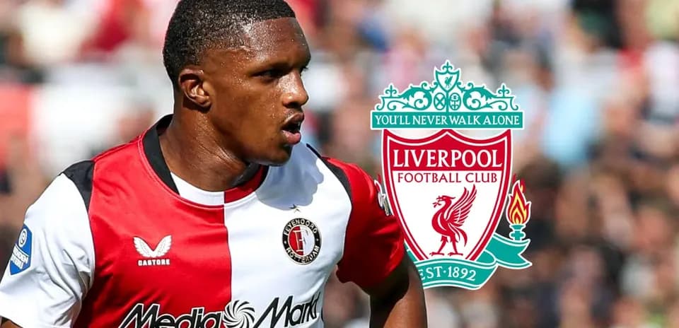 Player in Feyenoord kit with Liverpool logo background
