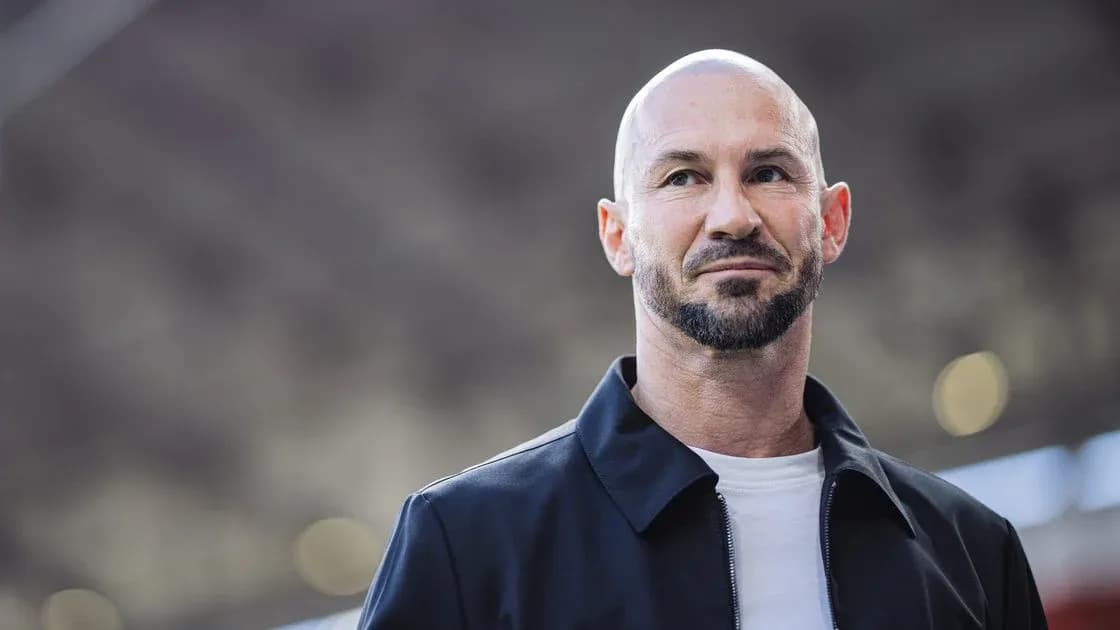 Man with beard and shaved head, outdoors
