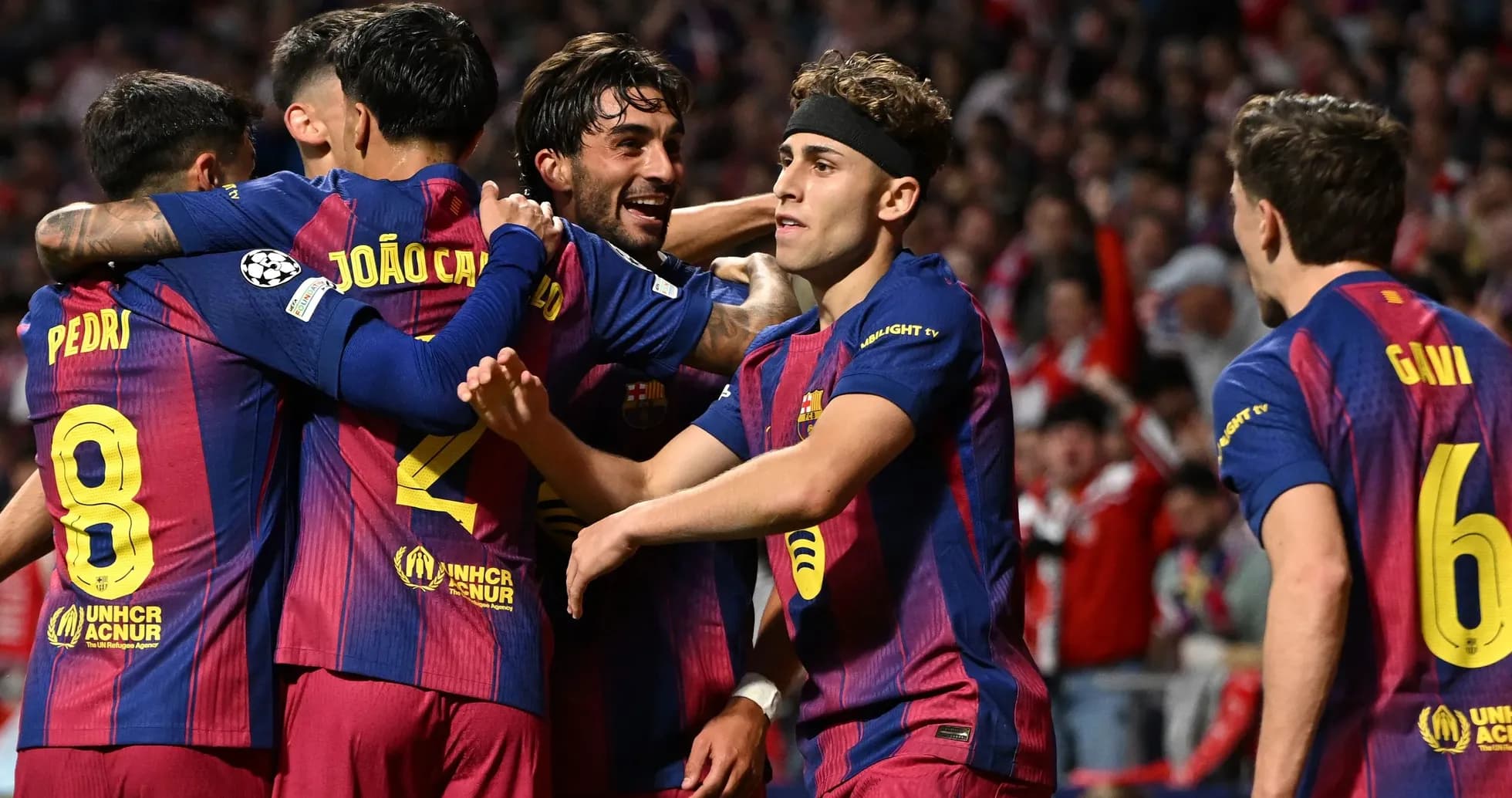 Barcelona players celebrating a goal during a match