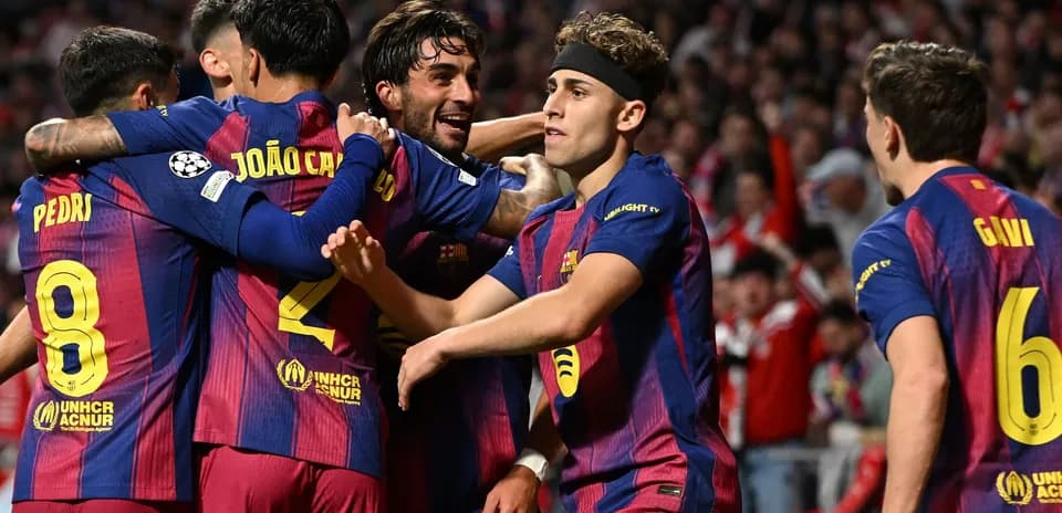 Barcelona players celebrating a goal during a match