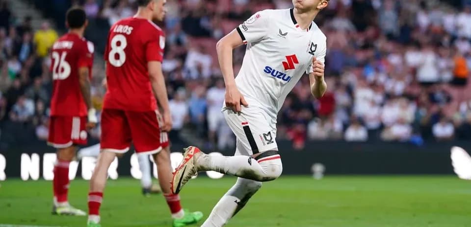 Player celebrating a goal during a football match