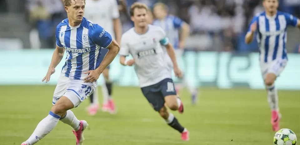 Lech Poznan player running with the ball