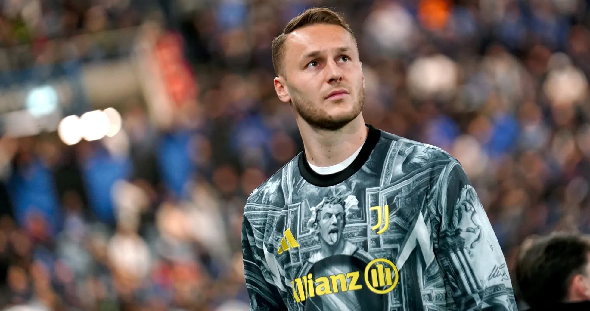Goalkeeper wearing unique Juventus jersey during match