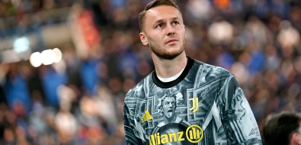 Goalkeeper wearing unique Juventus jersey during match