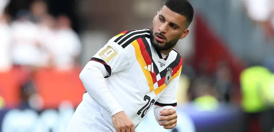 Player wearing Germany jersey during warm-up session