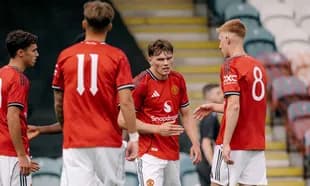Manchester United U21 players discussing during match