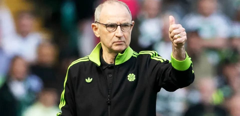 Manager giving a thumbs up during match