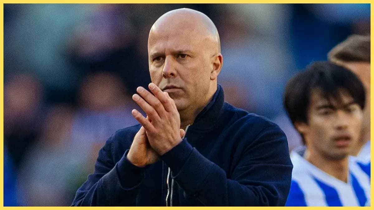 Coach clapping on the sidelines during match