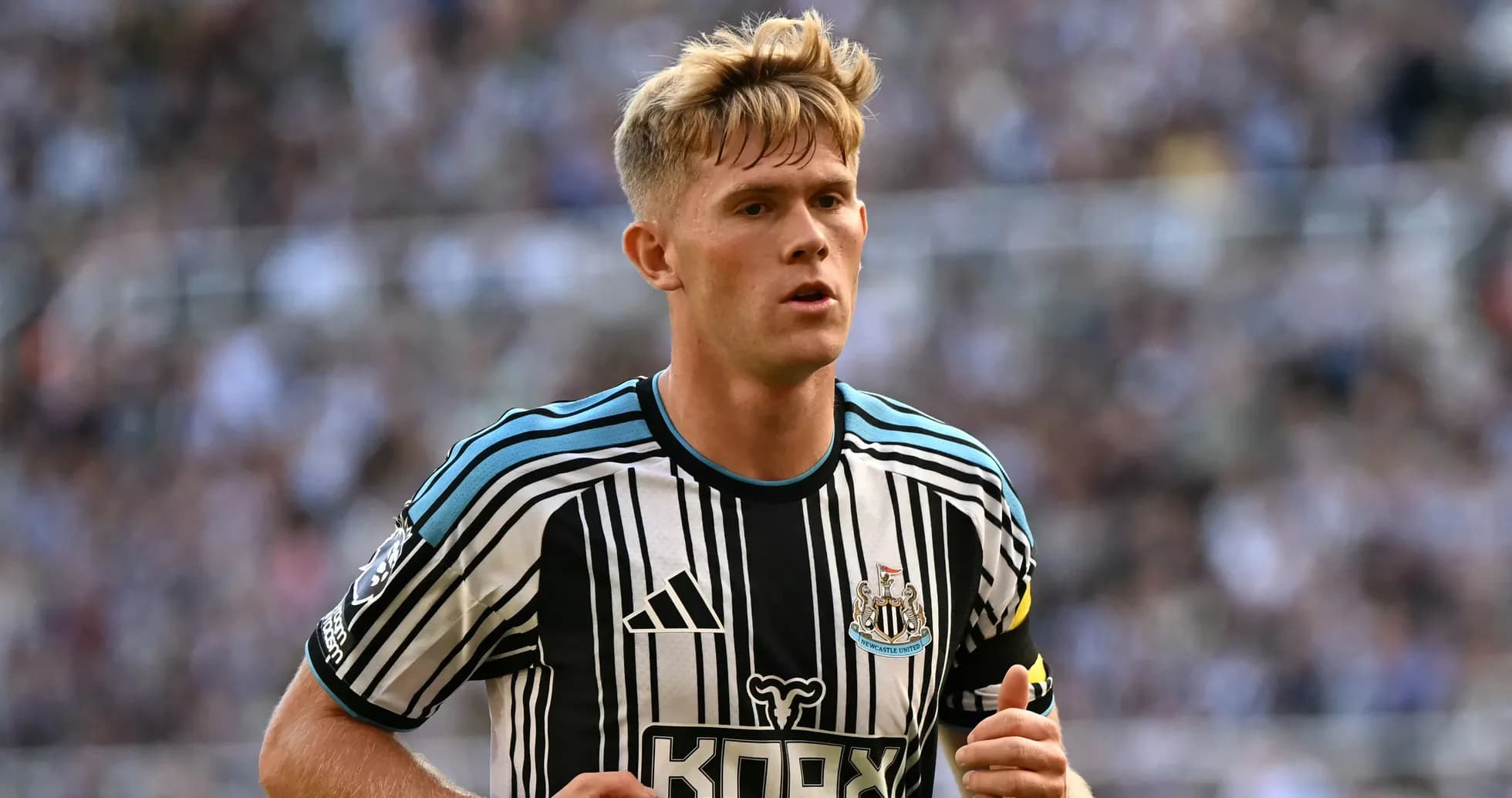 Newcastle player running during a match
