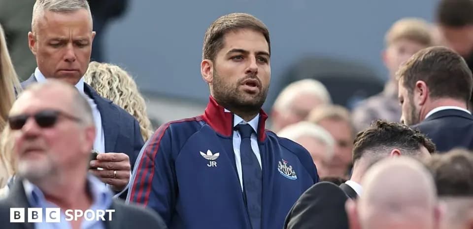 Man in Newcastle tracksuit among crowd at event