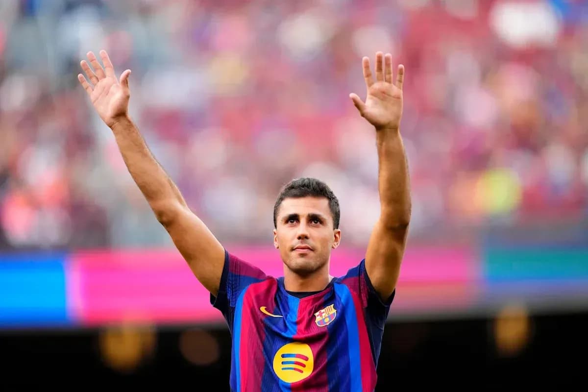 Player waving to fans at stadium