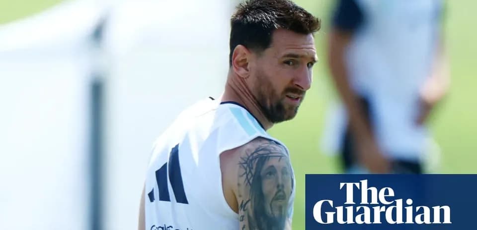 Lionel Messi training on the pitch with teammates