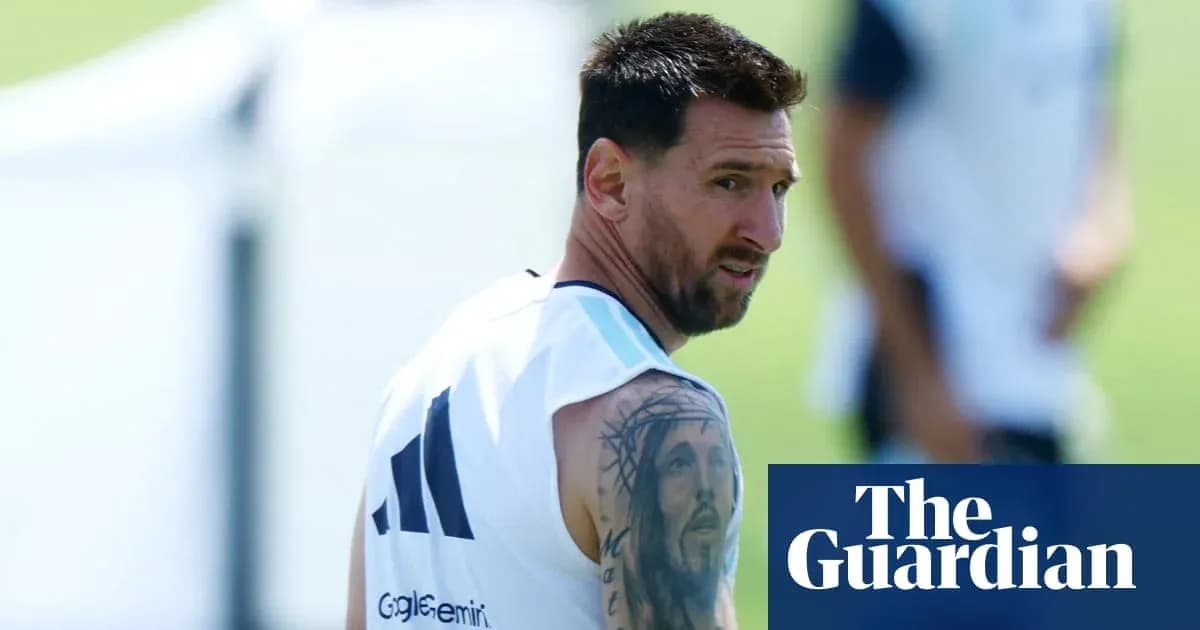 Lionel Messi training on the pitch with teammates
