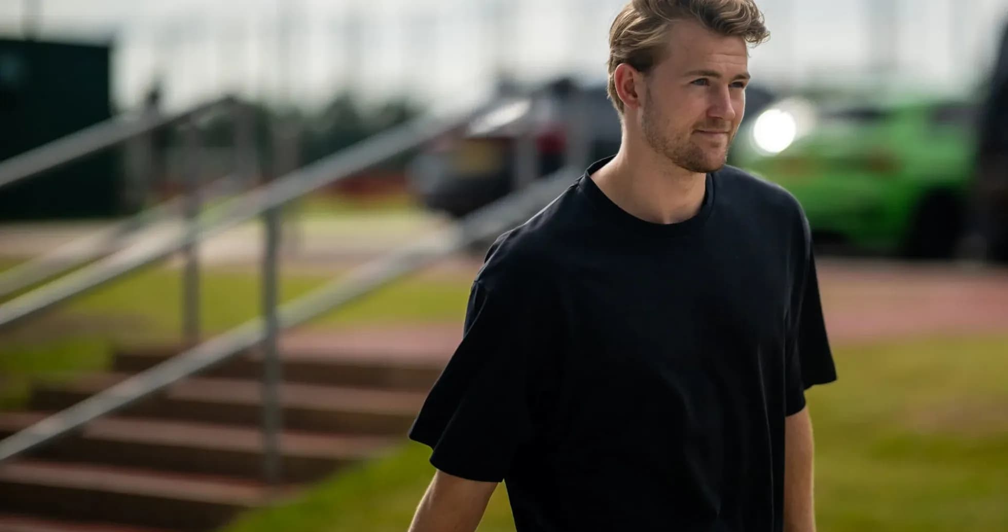Player walking towards the training ground entrance