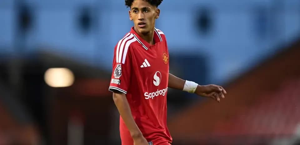 Player wearing Manchester United kit on the field