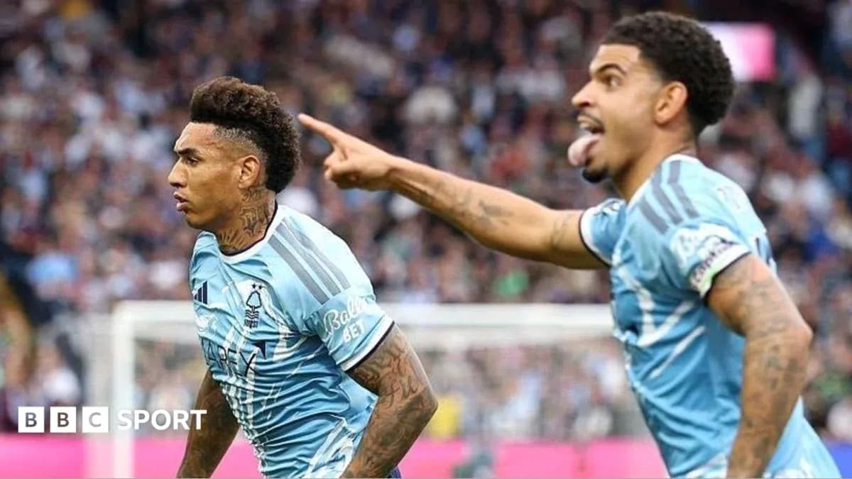 Two players celebrating a goal on the field