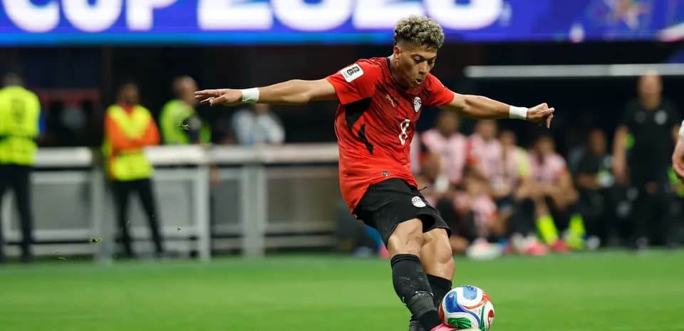 Player from Egypt kicking the ball during match
