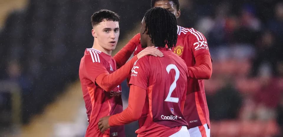 Manchester United players celebrating during a match