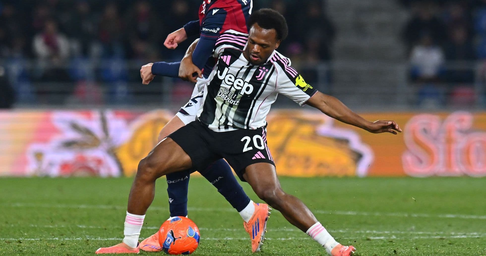 Player from Juventus attempting to control the ball