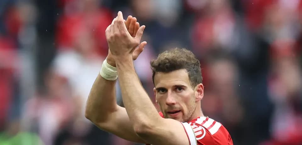 Player applauding fans after the match