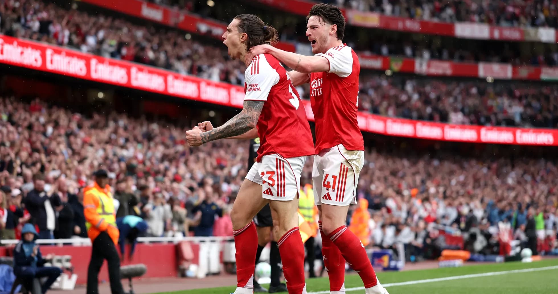 Players celebrating a goal during Arsenal match
